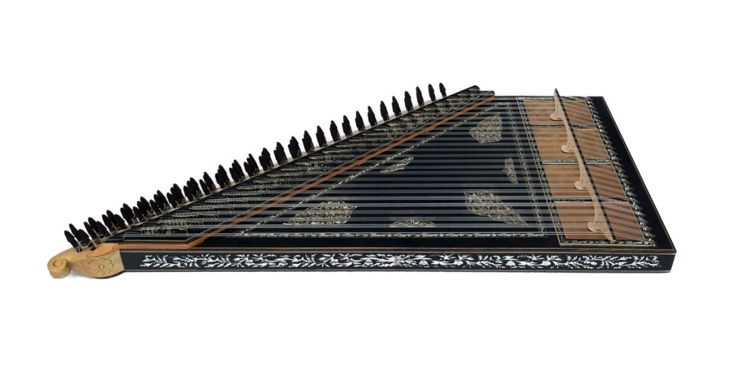 The Qanun is a large zither-like instrument with a flat, trapezoidal shape